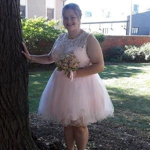 Baby pink homecoming dress from a local boutique. Size XL and the back is lace.